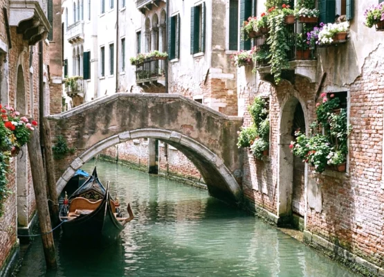 Gondola moored in Venice canal
