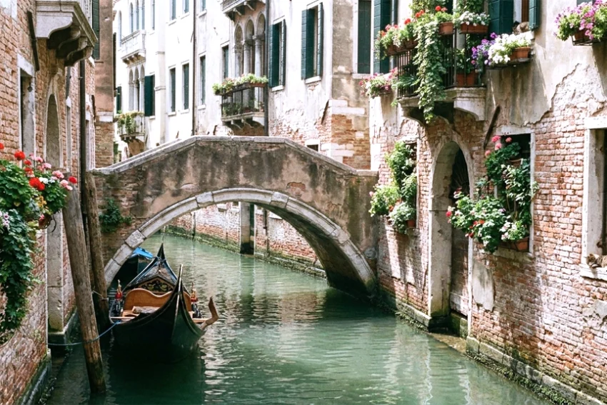 Gondola moored in Venice canal